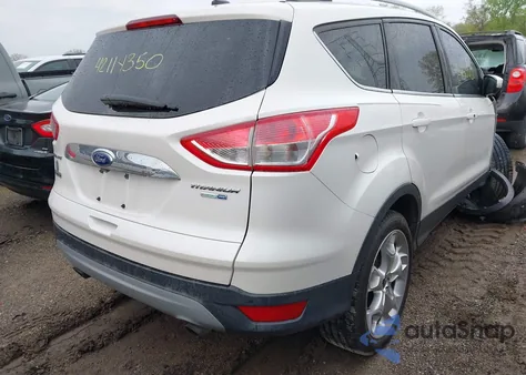 2016 Ford Escape Titanium z USA, uszkodzony, nr VIN 1FMCU9J95GUB81033